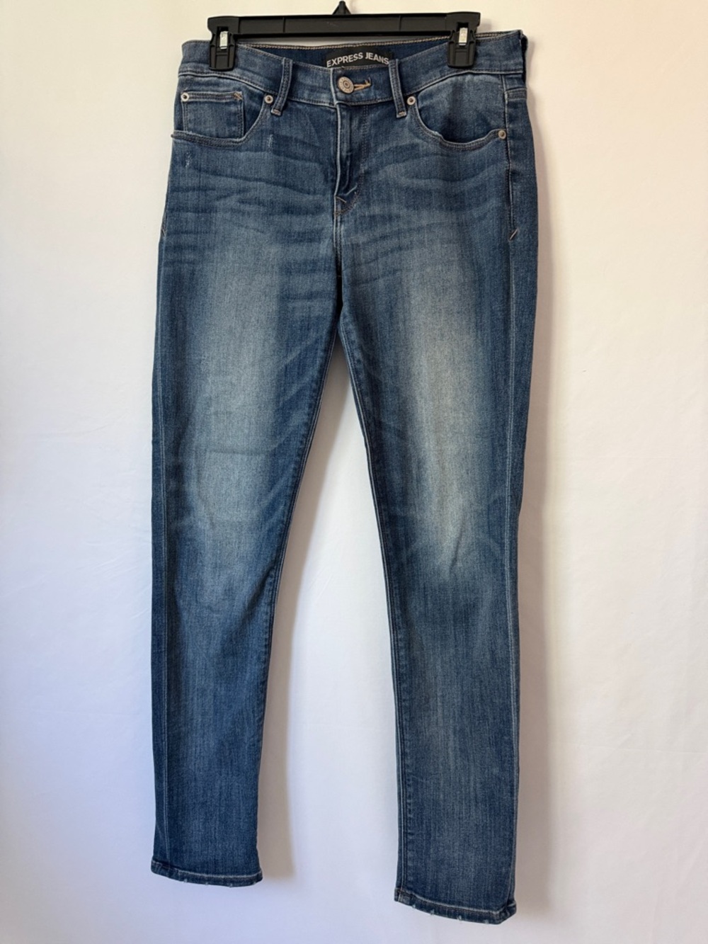 Express Women’s super Skinny mid rise Jeans